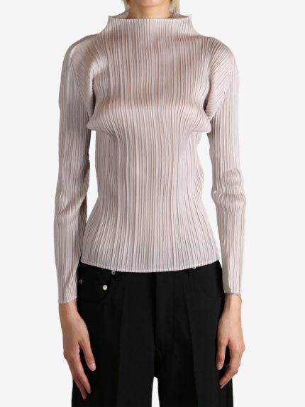 Purple pullover worn by a person, showing the pullover fit