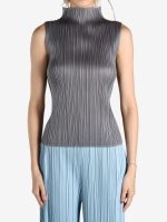 Grey shirt worn by a person, showing the shirt's fit