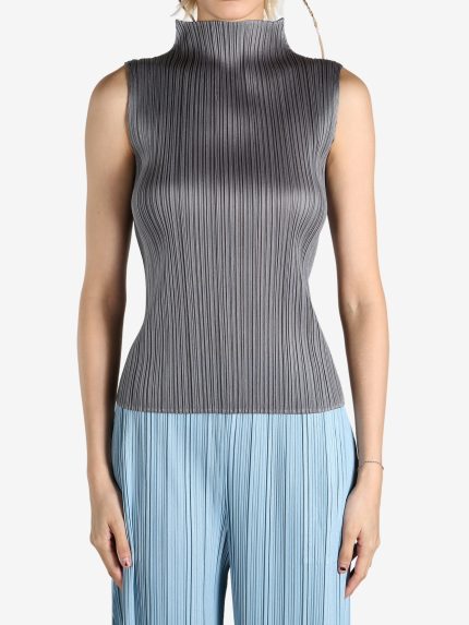 Grey shirt worn by a person, showing the shirt's fit