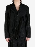 Black jacket worn by a person, showing the jacket's fit