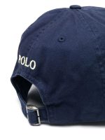 Close up of navy cap, showing texture of the cotton fabric