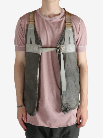 Grey vest worn by a person, showing the vest fit