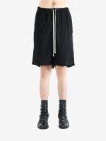 Black shorts worn by a person, showing the shorts's fit