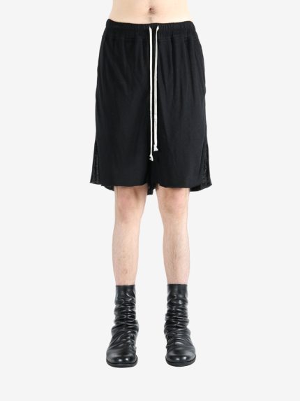Black shorts worn by a person, showing the shorts's fit