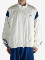 White jacket worn by a person, showing the jacket's fit