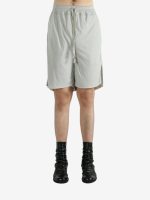 White shorts worn by a person, showing the shorts's fit