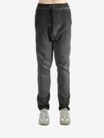 Grey pants worn by a person, showing the pants fit