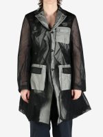 Black jacket worn by a person, showing the jacket fit